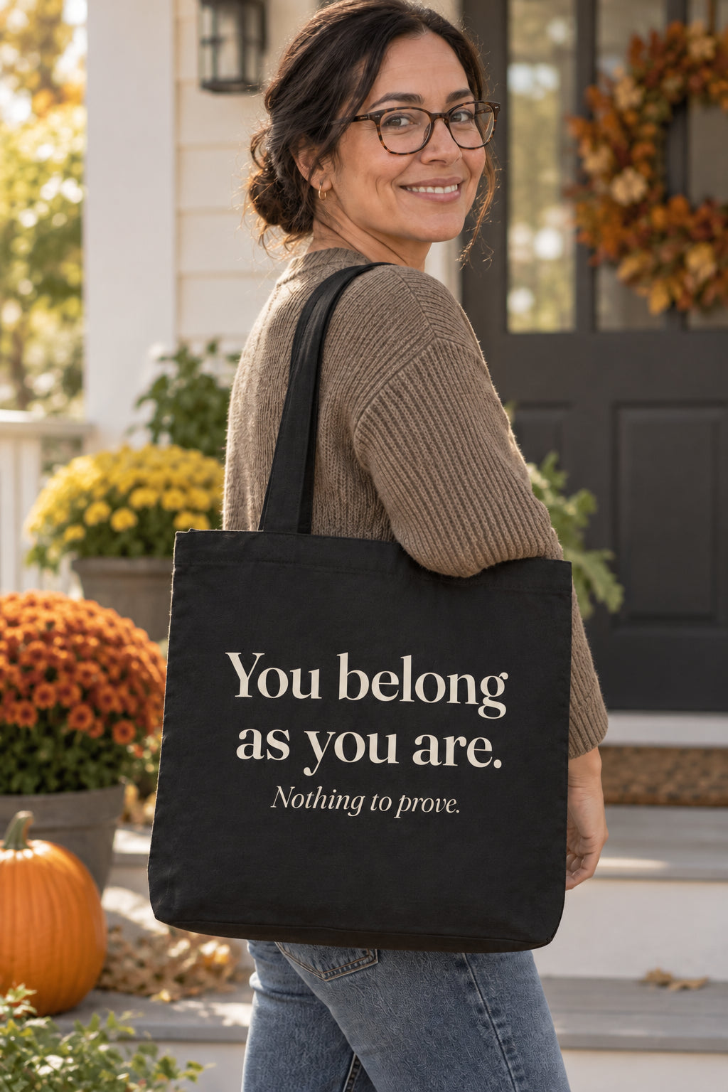 You belong as you are. organic canvas market tote in Black, carried on the shoulder