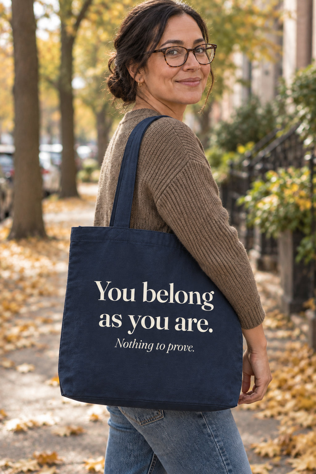 You belong as you are. organic canvas market tote in Navy, carried on the shoulder