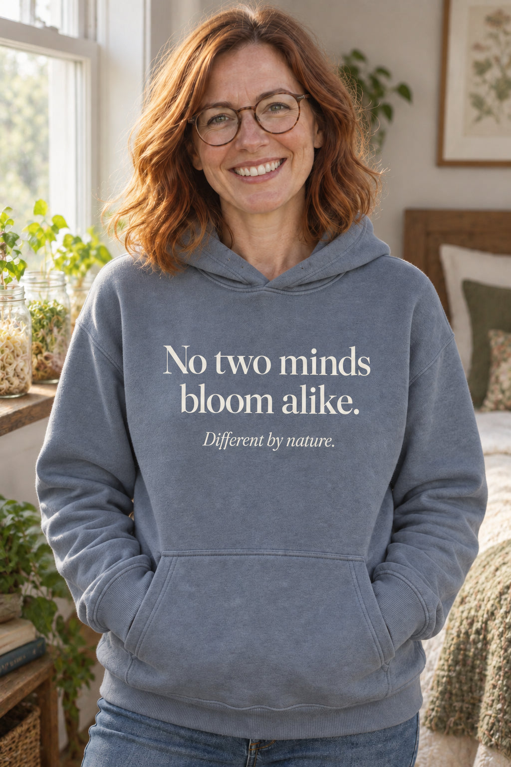 No two minds bloom alike. unisex organic cotton hoodie in Slate, front