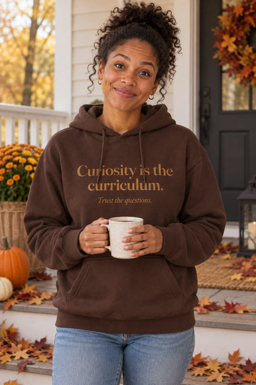 Curiosity is the curriculum. unisex organic cotton hoodie in Bark, front