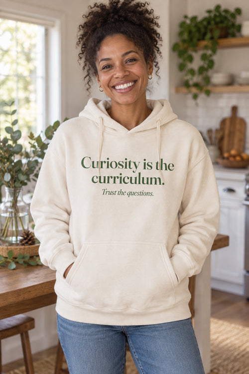 Curiosity is the curriculum. unisex organic cotton hoodie in Natural, front