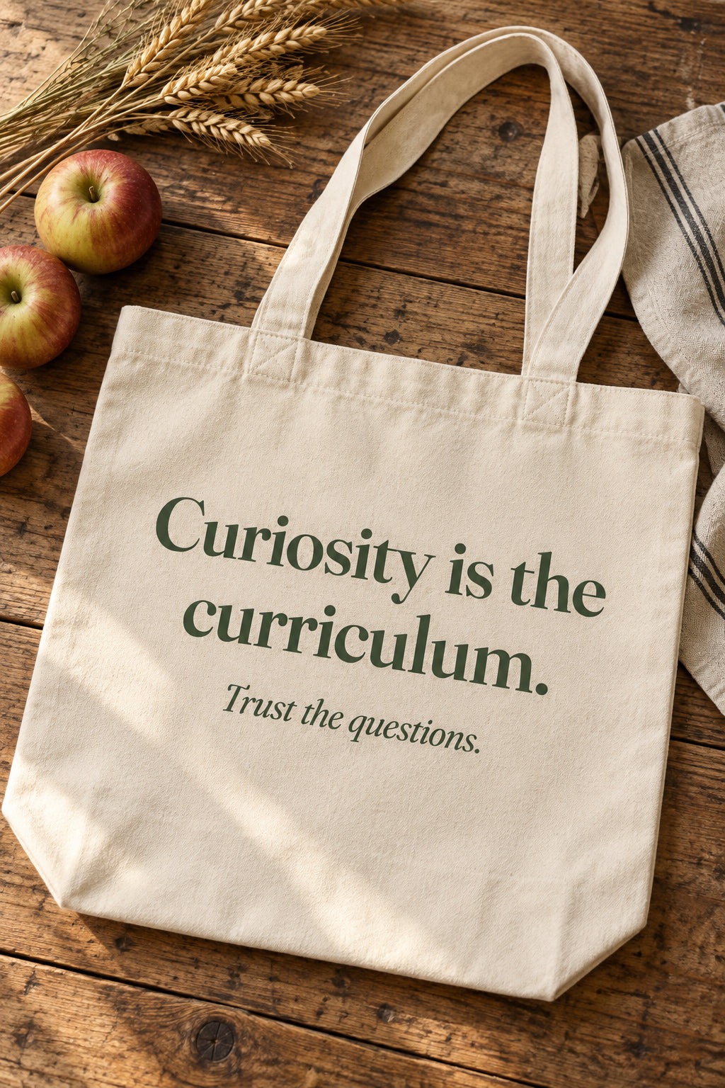 Curiosity is the curriculum. organic canvas market tote in Natural, flat lay