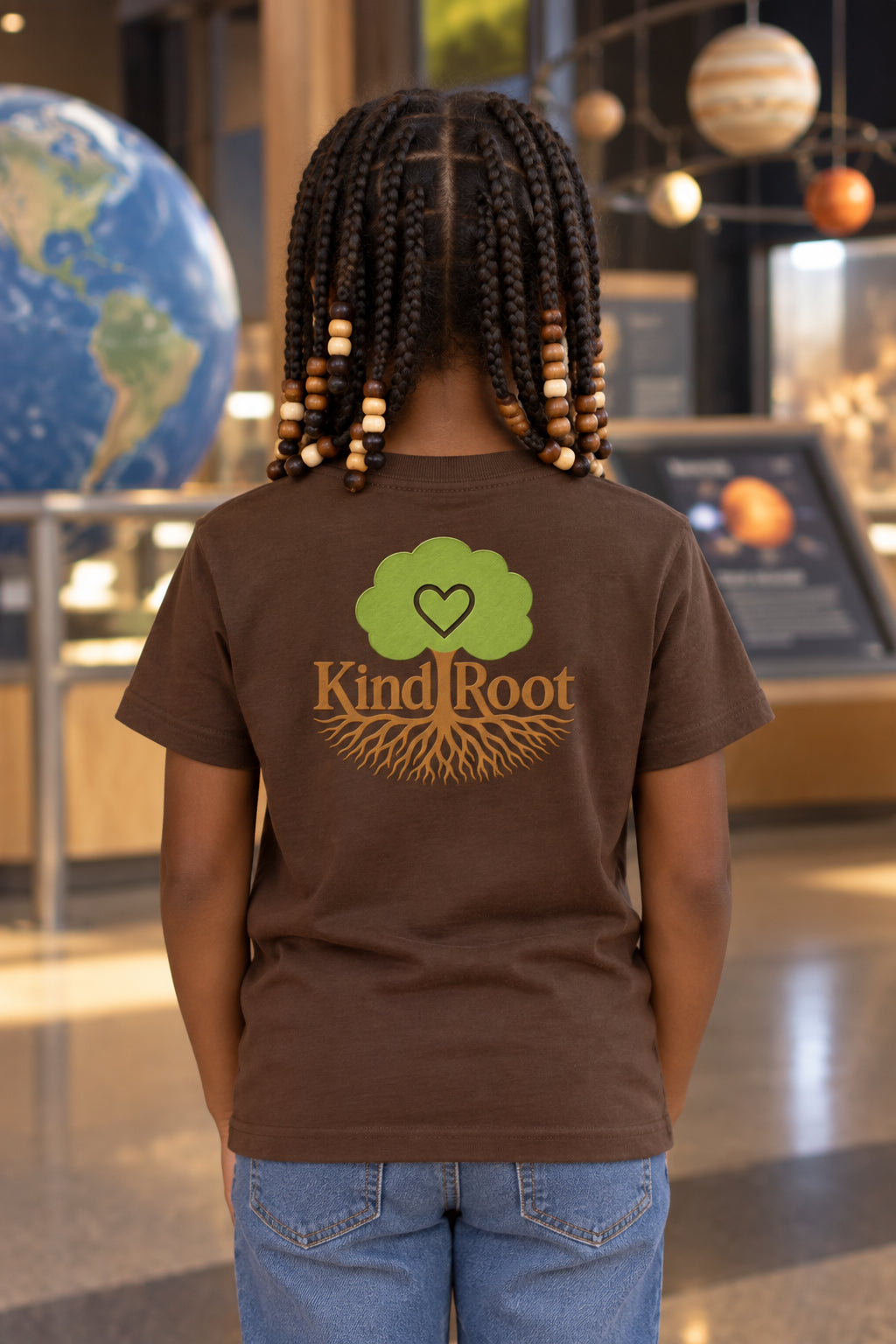 KindRoot logo on the back of the Bark kids organic cotton tee