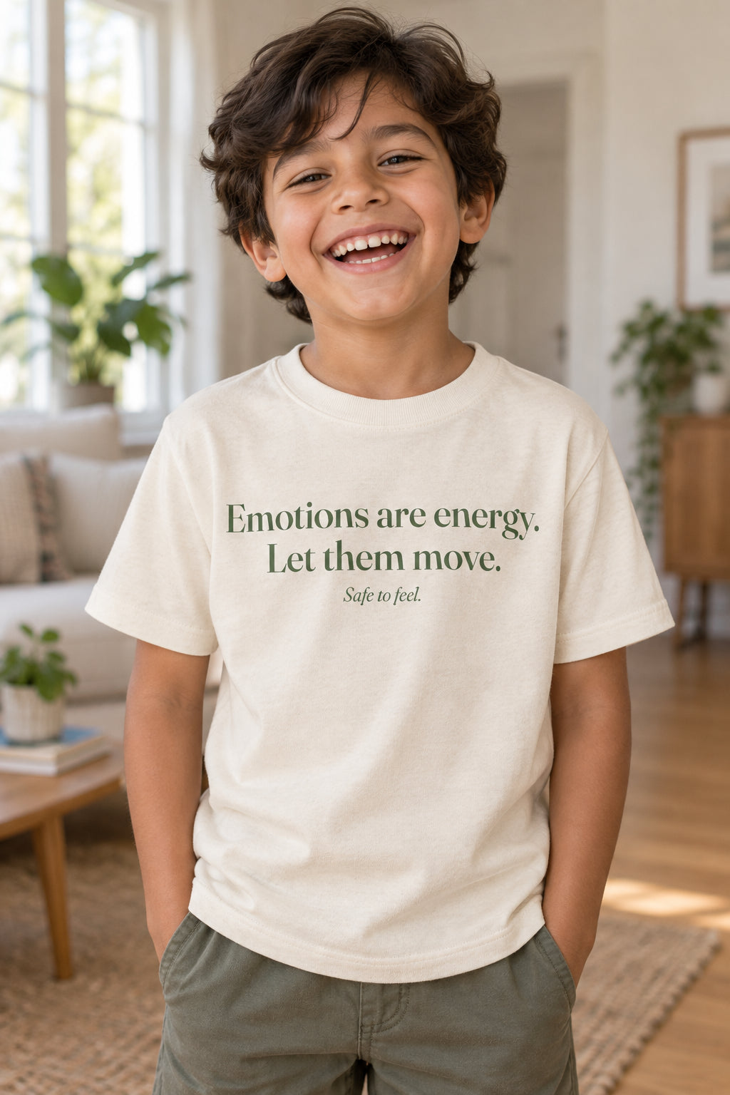 Emotions are energy. Let them move. kids organic cotton tee in Natural, front