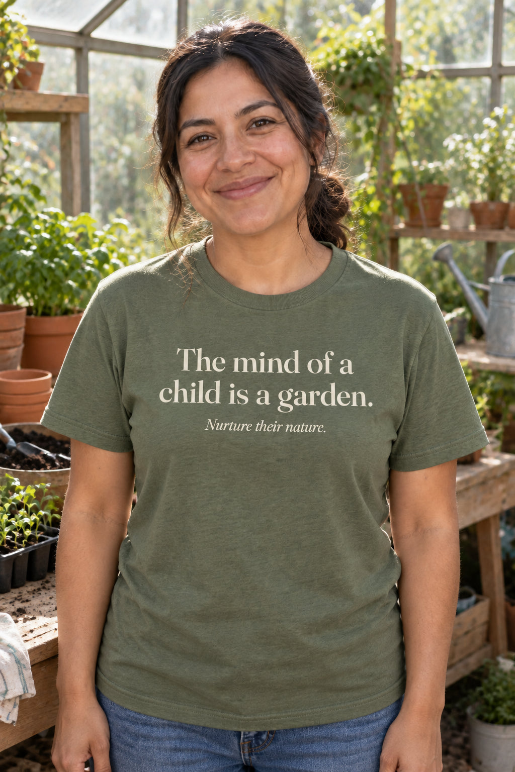 The mind of a child is a garden. unisex organic cotton tee in Moss, front