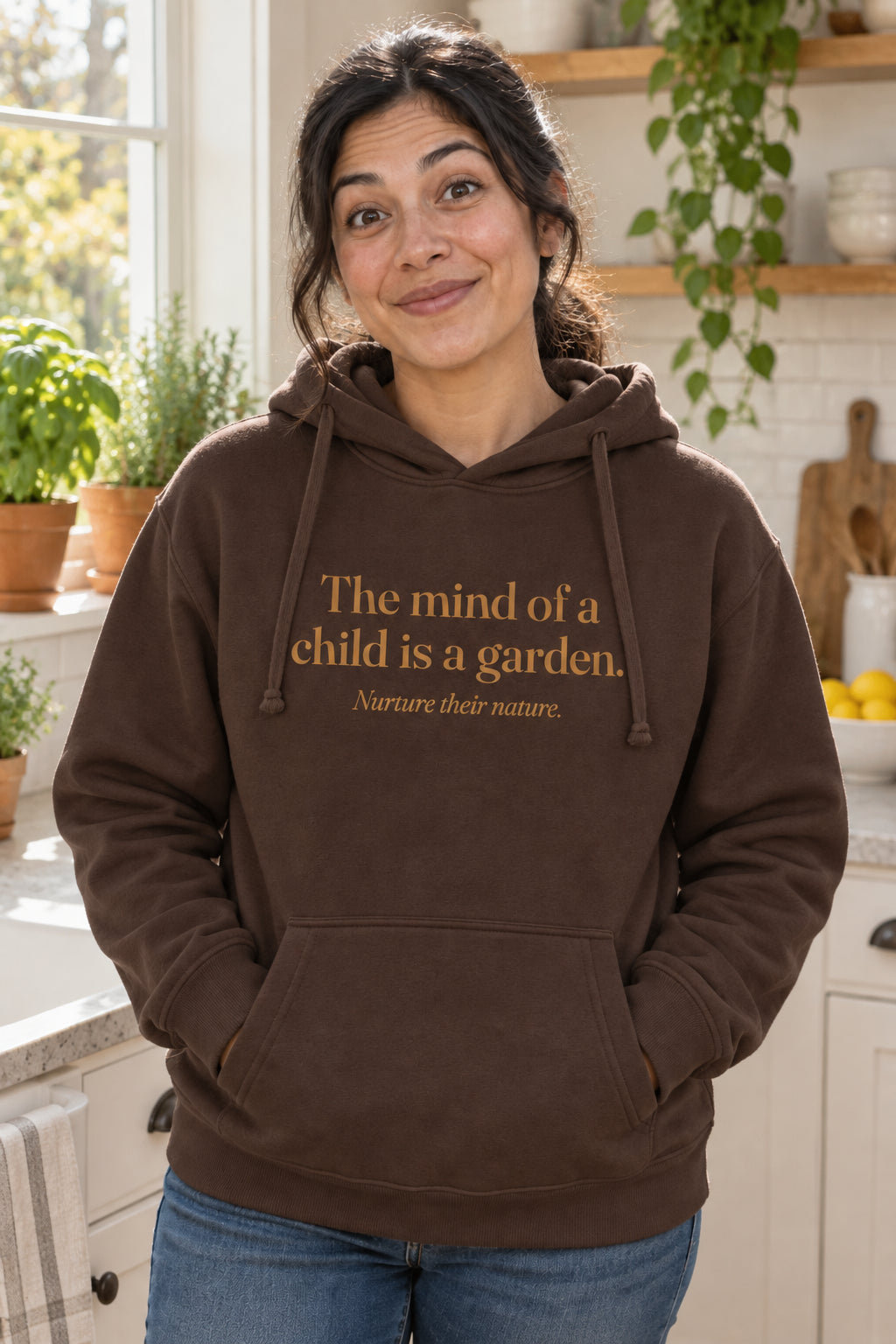 The mind of a child is a garden. unisex organic cotton hoodie in Bark, front