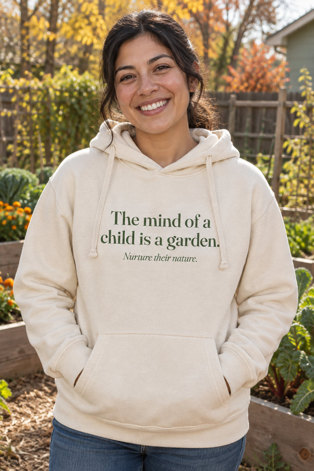 The mind of a child is a garden. unisex organic cotton hoodie in Natural, front