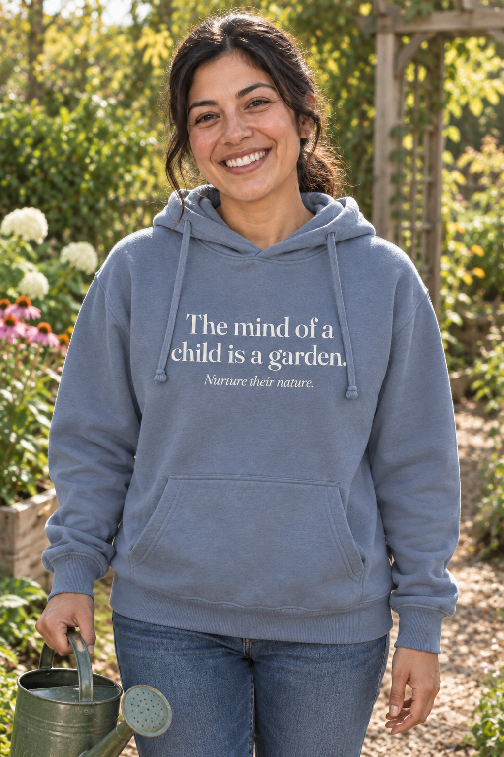 The mind of a child is a garden. unisex organic cotton hoodie in Slate, front
