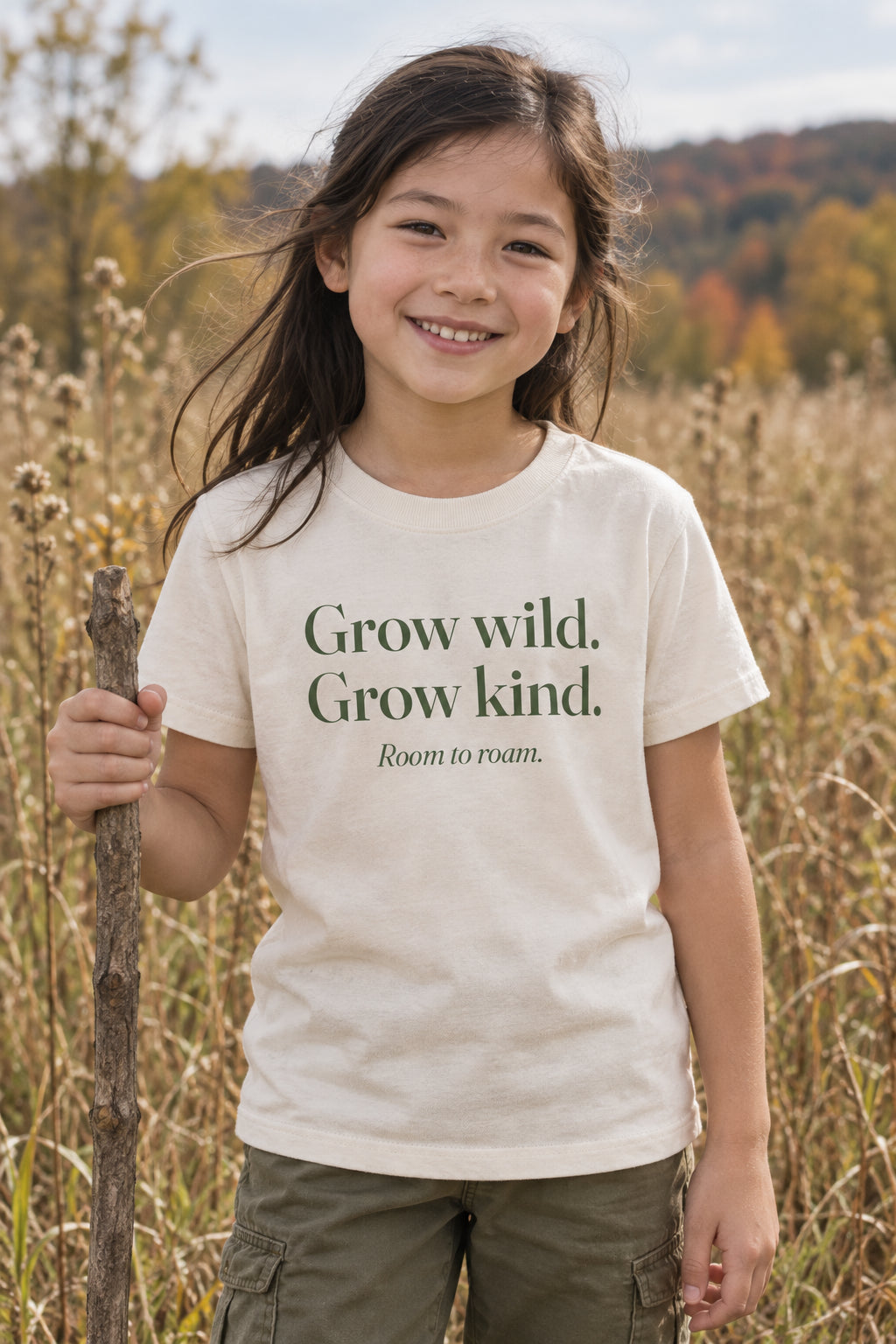Grow wild. Grow kind. kids organic cotton tee in Natural, front