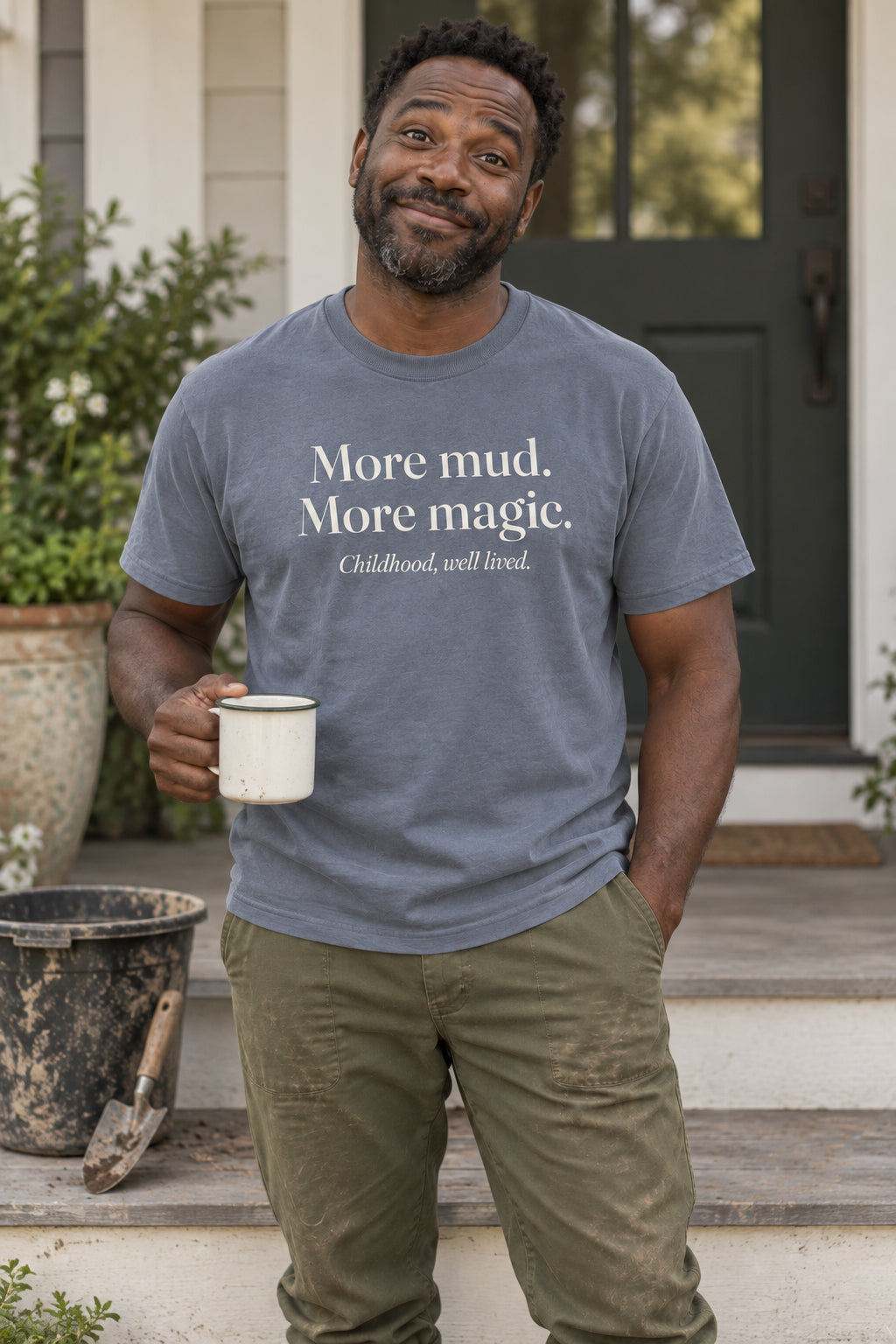 More mud. More magic. unisex organic cotton tee in Slate, front