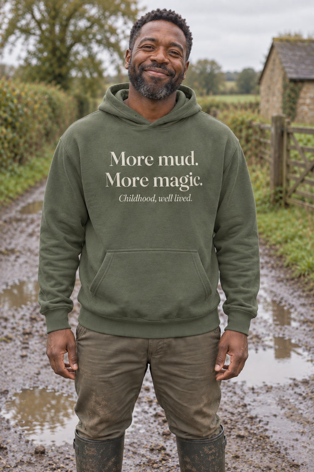 More mud. More magic. unisex organic cotton hoodie in Moss, front