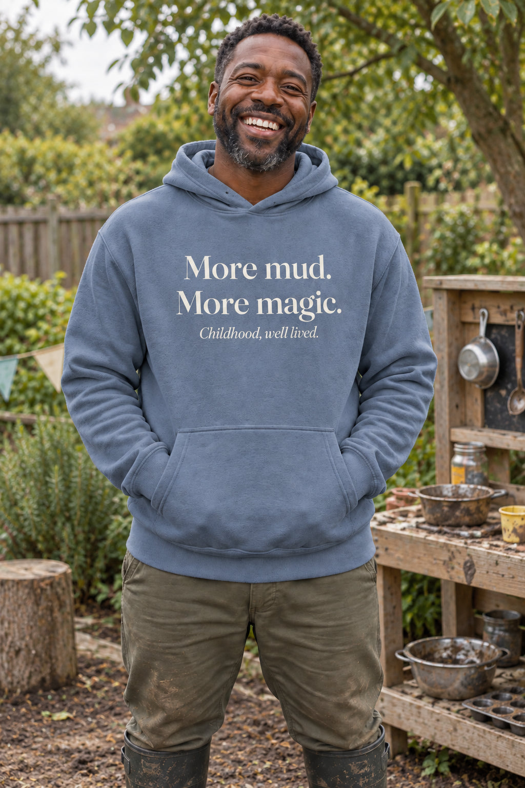 More mud. More magic. unisex organic cotton hoodie in Slate, front