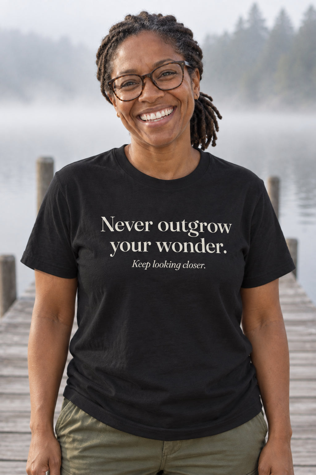 Never outgrow your wonder. unisex organic cotton tee in Night, front