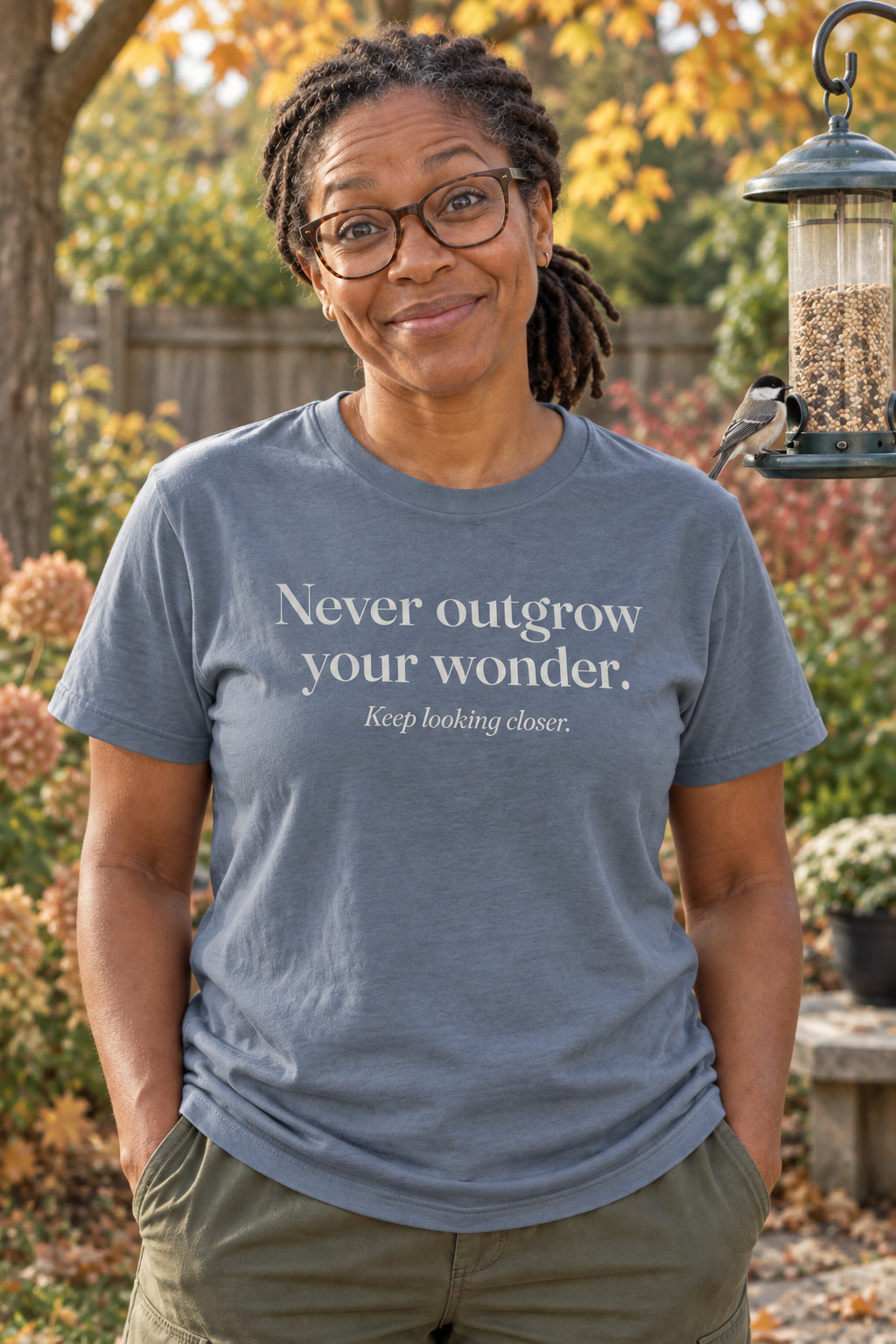 Never outgrow your wonder. unisex organic cotton tee in Slate, front