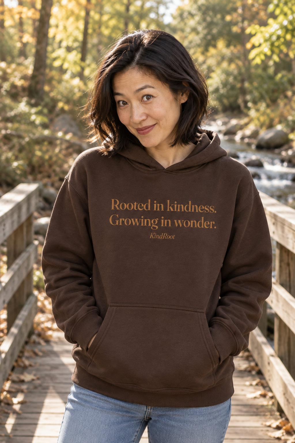Rooted in kindness. Growing in wonder. unisex organic cotton hoodie in Bark, front