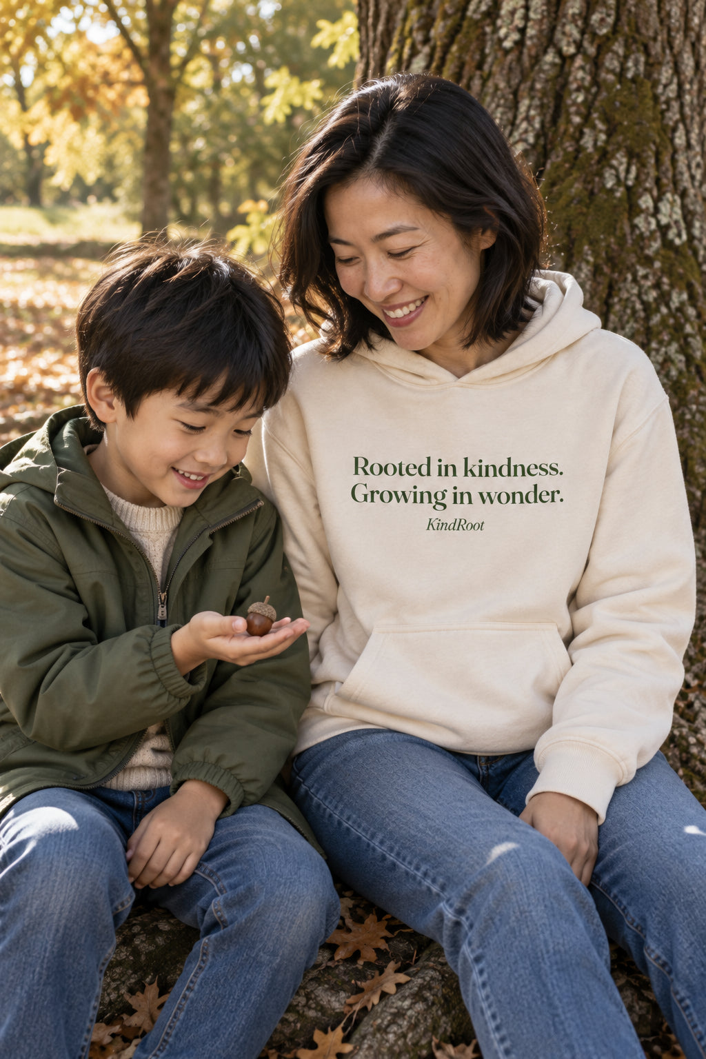 Parent wearing the Rooted in kindness. Growing in wonder. hoodie tee in Natural