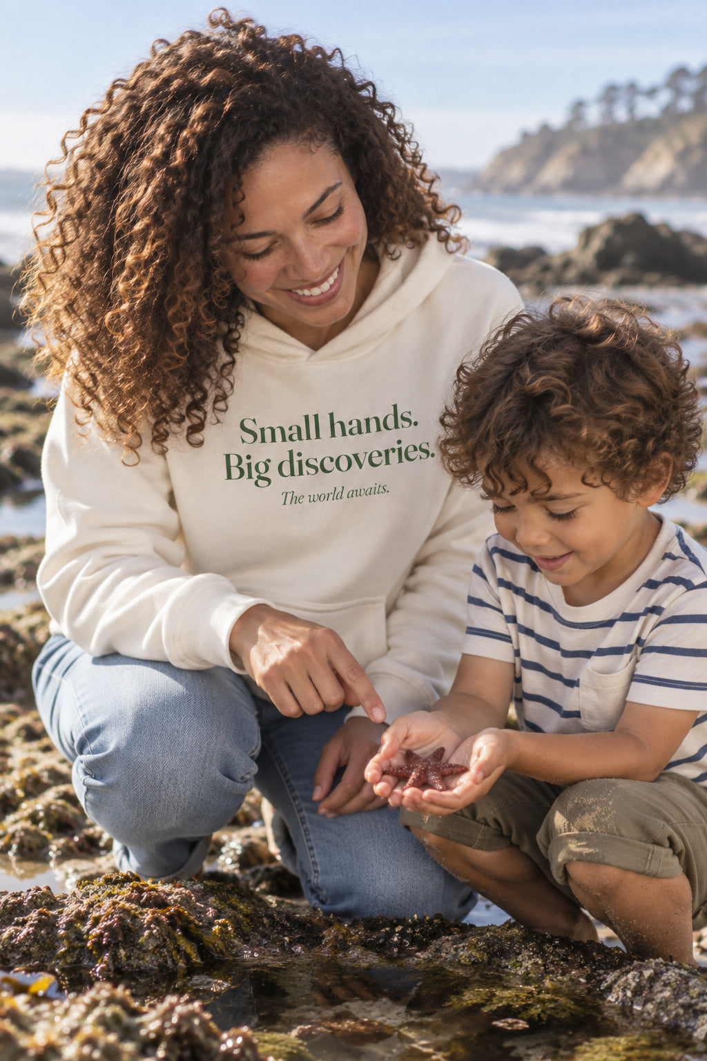 Parent wearing the Small hands. Big discoveries. hoodie tee in Natural