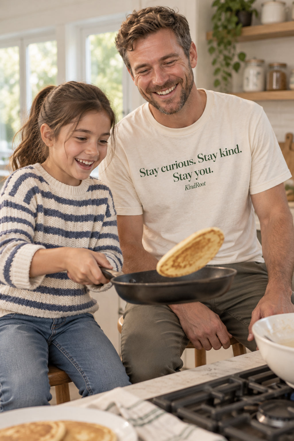 Parent wearing the Stay curious. Stay kind. Stay you. adult tee in Natural