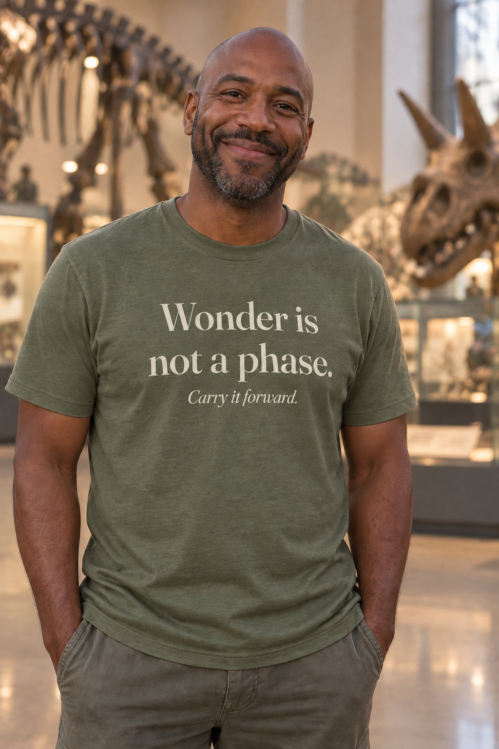 Wonder is not a phase. unisex organic cotton tee in Moss, front