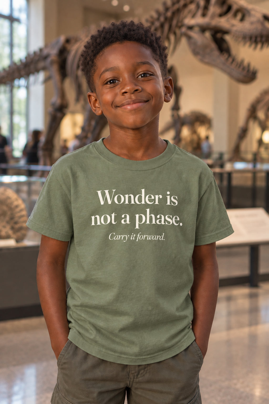 Wonder is not a phase. kids organic cotton tee in Avocado, front